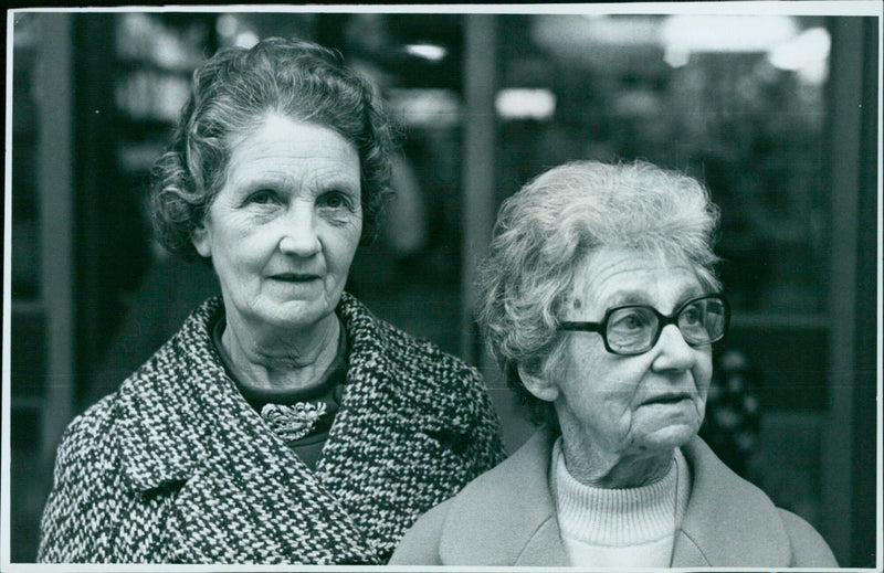 Mrs Mary Dudley and Mrs Alice Webb pack items at a local store. - Vintage Photograph