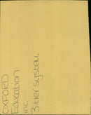 Students studying in a classroom with a 3-tier education system. - Vintage Photograph