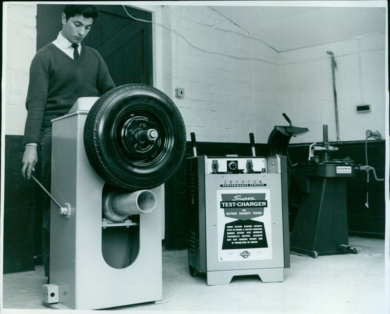 An electronic wheel balancer in operation at Foremost Tyre Services' new depot in Oxford, England on May 4, 1967. - Vintage Photograph