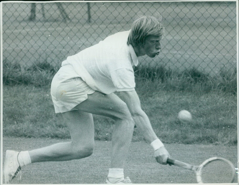 Cambridge University's tennis team triumphs against Oxford University in the Varsity match on May 13, 1975. - Vintage Photograph