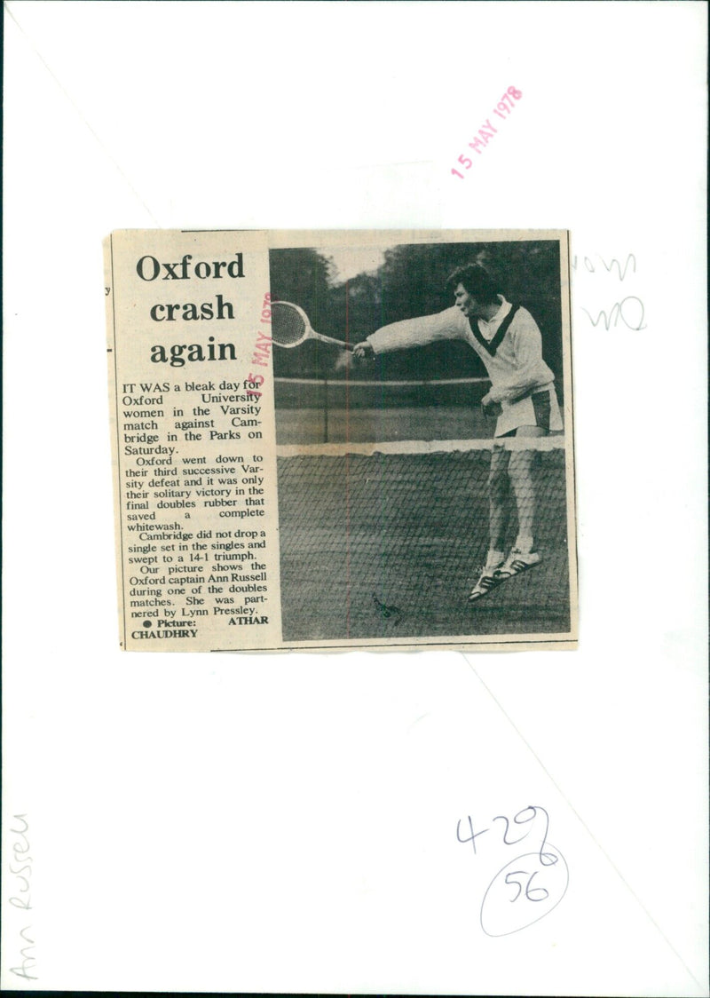 Oxford University women's tennis captain Ann Russell in a doubles match at the Varsity match against Cambridge in the Parks on Saturday. - Vintage Photograph