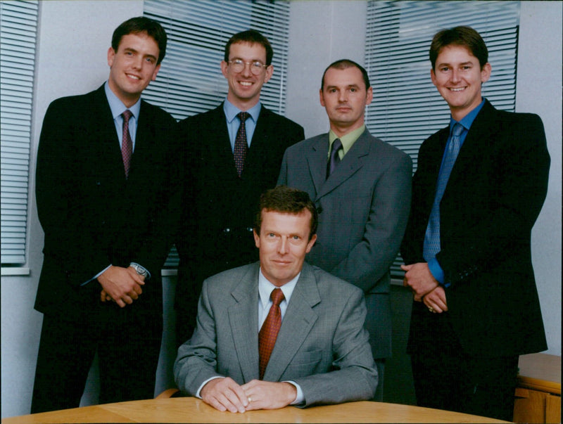 Five members of the Ox firms- BUSINESS Savills FPD Savills team pose for a photograph. - Vintage Photograph