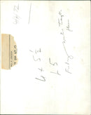 Eleven men in industrial clothing stand beside a water tank at a facility. - Vintage Photograph