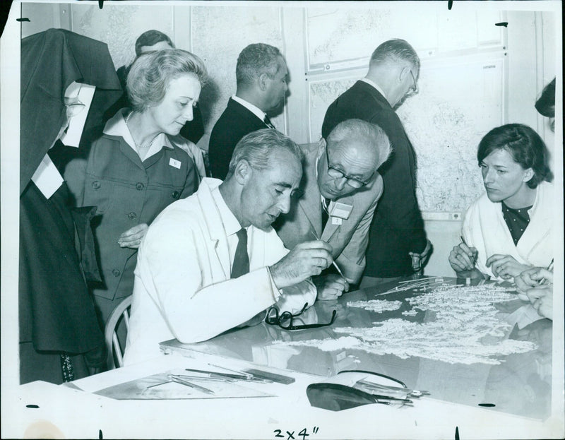 Members of the 20th International Geographical Congress visit the Cartographic Department at the Clarendon Press in Oxford, UK. - Vintage Photograph