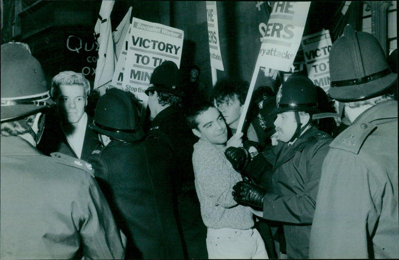 Workers hold a demonstration to protest government attacks on their rights. - Vintage Photograph