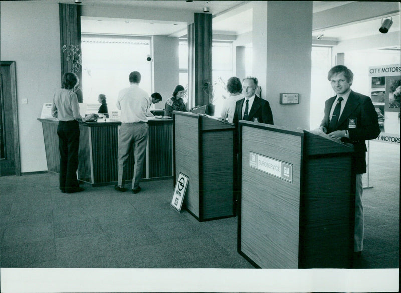 Employees working at Opel Euroservice GM City Motors in Berlin, Germany. - Vintage Photograph