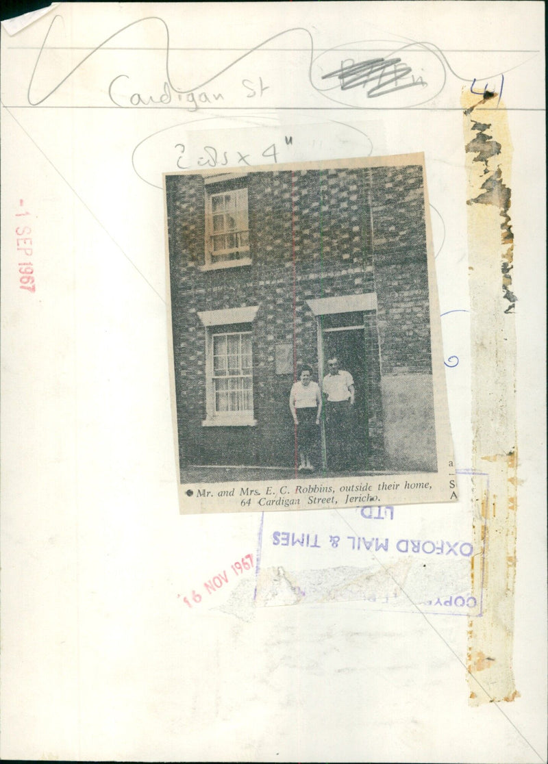 Mr. and Mrs. E. C. Robbins standing outside their home in Jericho, England. - Vintage Photograph