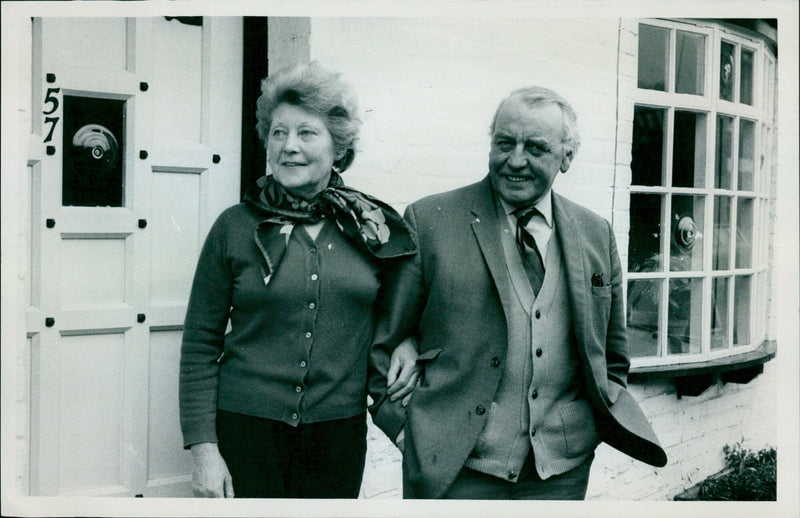 Mr. and Mrs. Howarth outside their newly improved home in Great Clarendon Street. - Vintage Photograph