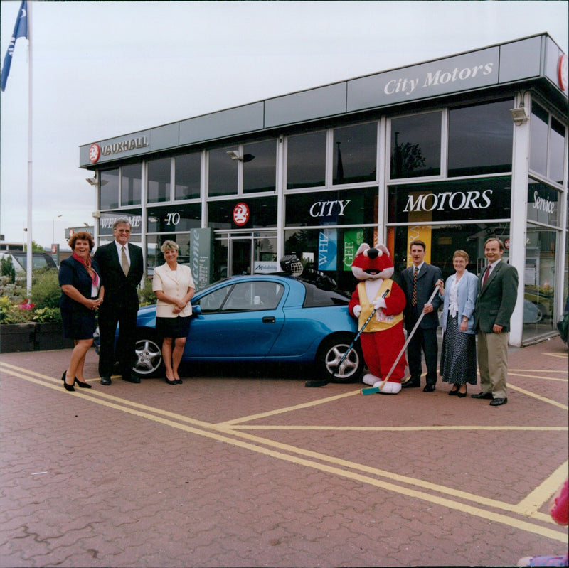 Customers of City Motors in Oxford receive their cars as part of the Motability scheme. - Vintage Photograph