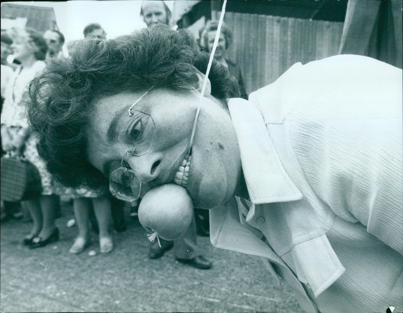 Mrs. Margaret Butter enjoys a picnic lunch at a local park. - Vintage Photograph