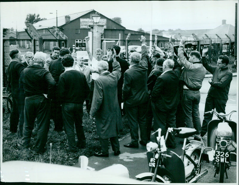 Employees of British Railways Southern Region vote during a meeting held outside the Sandy Lane Depot. - Vintage Photograph