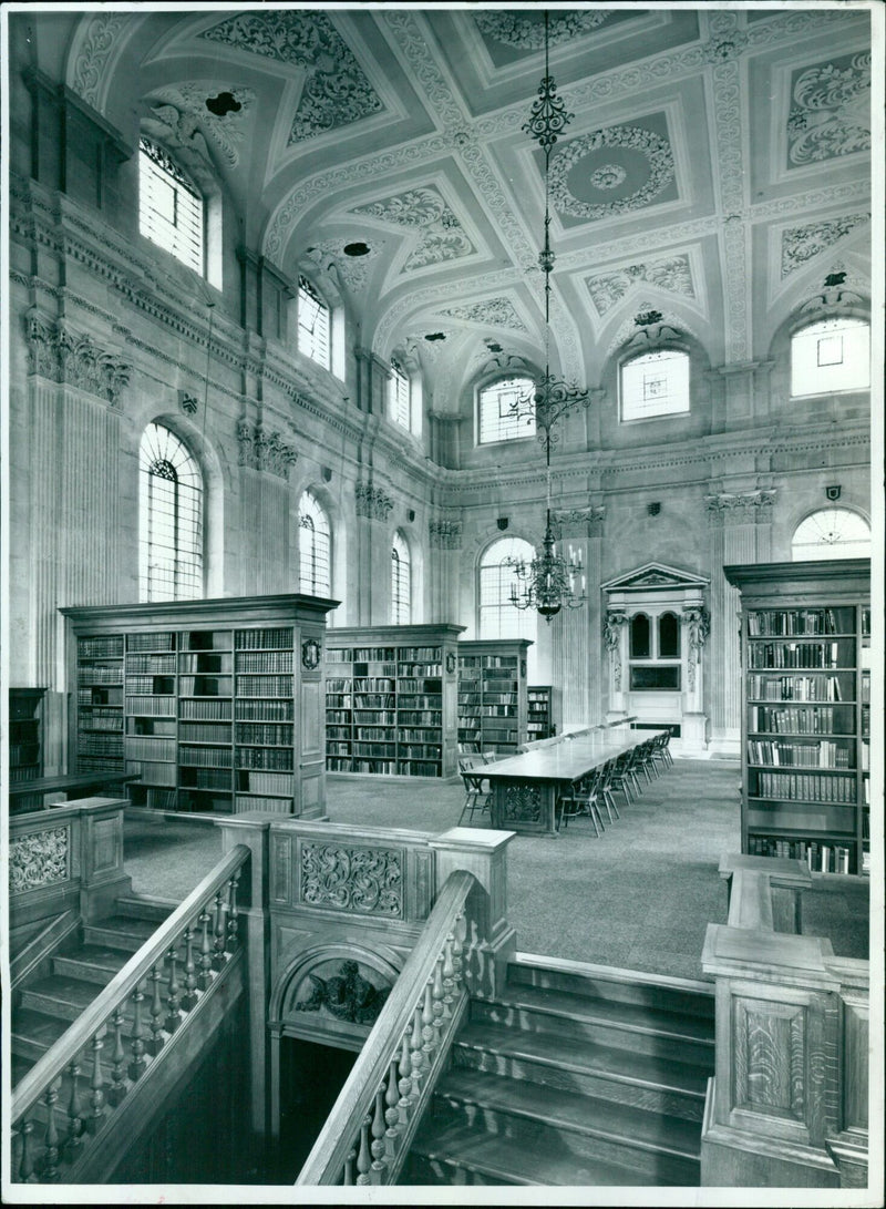 Students attend the first anniversary celebration of the Lincoln College Library at Oxford University. - Vintage Photograph