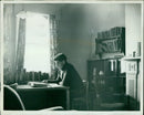 Students studying in a library. - Vintage Photograph