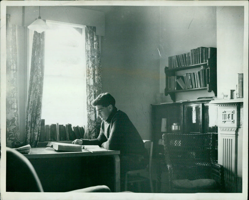 Students studying in a library. - Vintage Photograph