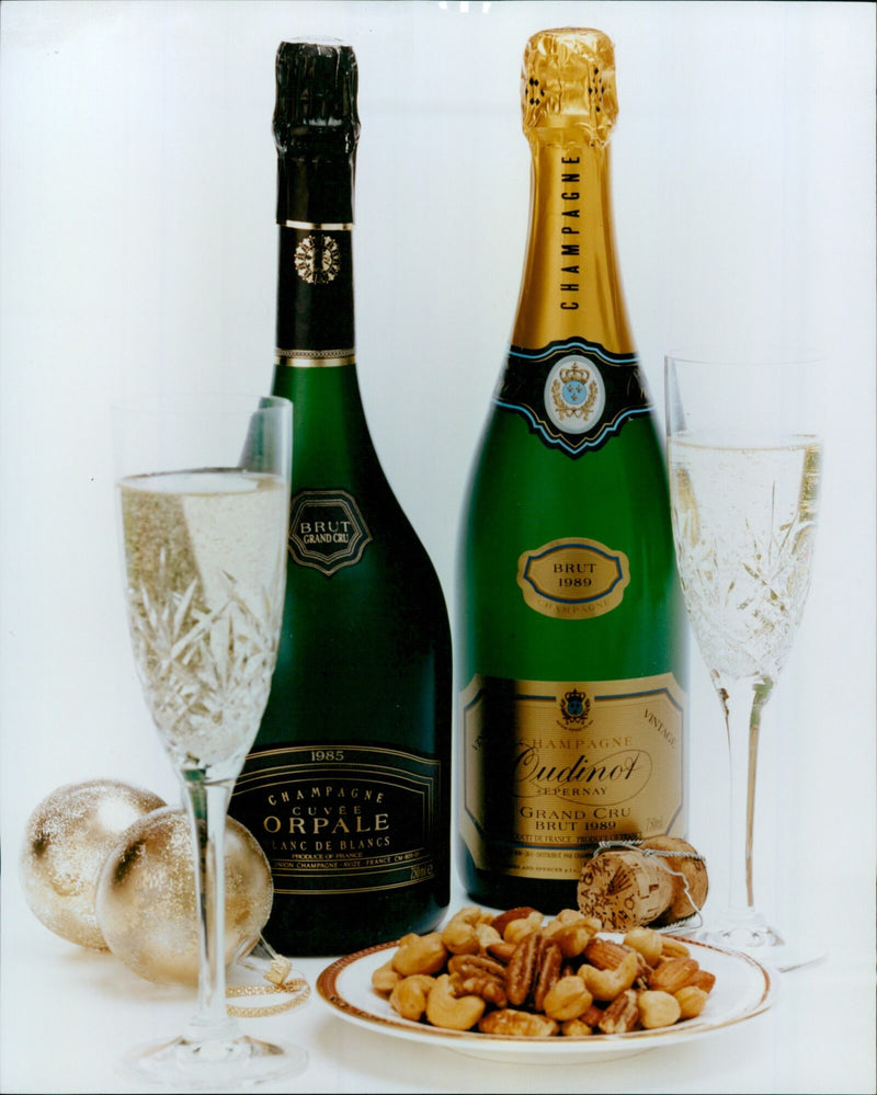 A selection of vintage French champagne from Oudinot Depernay, Brut Grand Cru 1985, Union Champagne Avize, and Brut 1989. - Vintage Photograph