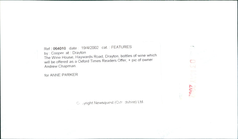 Andrew Chapman, owner of Drayton The Wine House, poses with bottles of La Colombe Chablis Appellation Chablis Conte 0 in Haywards Road, Drayton. - Vintage Photograph