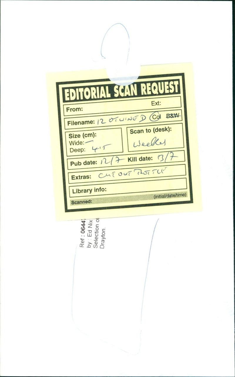 A bottle of Beaujolais Villages wine from the Cuvée à l'Ancienne label sits on a table. - Vintage Photograph