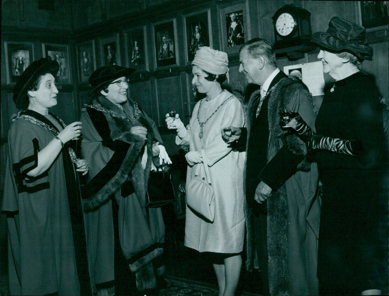 Oxford University graduates celebrate their graduation day. - Vintage Photograph