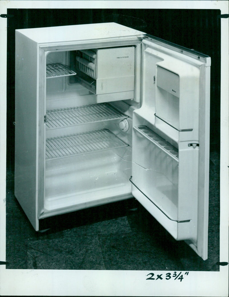 An open view of the Prestcold Packaway refrigerator. - Vintage Photograph