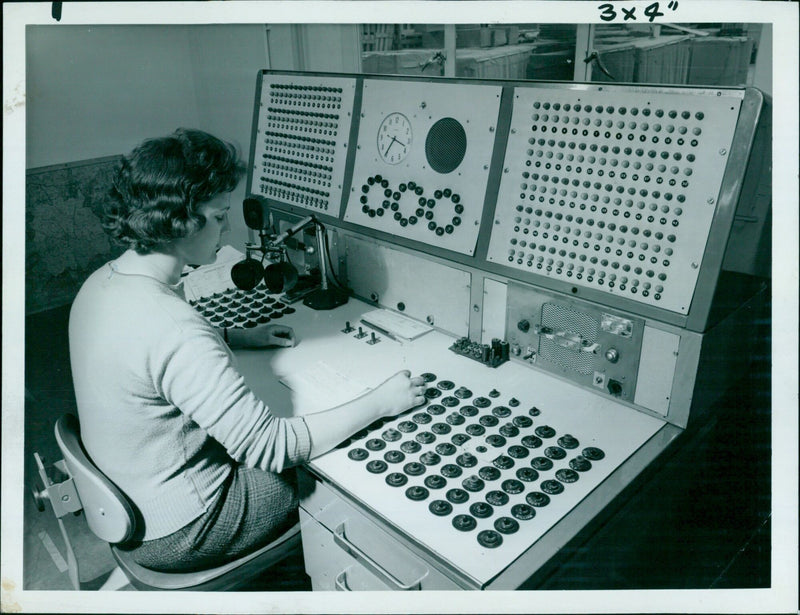 A radio control room at the new London region headquarters of the Pressed Steel Company's Prestcold division. - Vintage Photograph