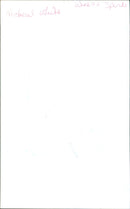 A woman poses with a bottle of Micheal white wine and a glass of spirits in a Parisian bar. - Vintage Photograph