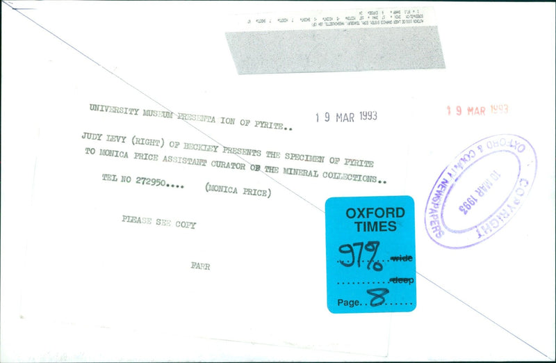 Judy Levy presents a specimen of pyrite to Monica Price at the University Museum presentation. - Vintage Photograph