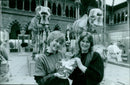 Judy Levy presents a specimen of pyrite to Monica Price at the University Museum presentation. - Vintage Photograph