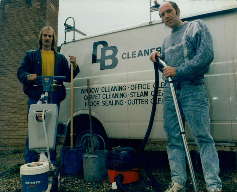 Dave Clarke and Bill Gardner of Beckley Cleaners demonstrate window cleaning equipment. - Vintage Photograph