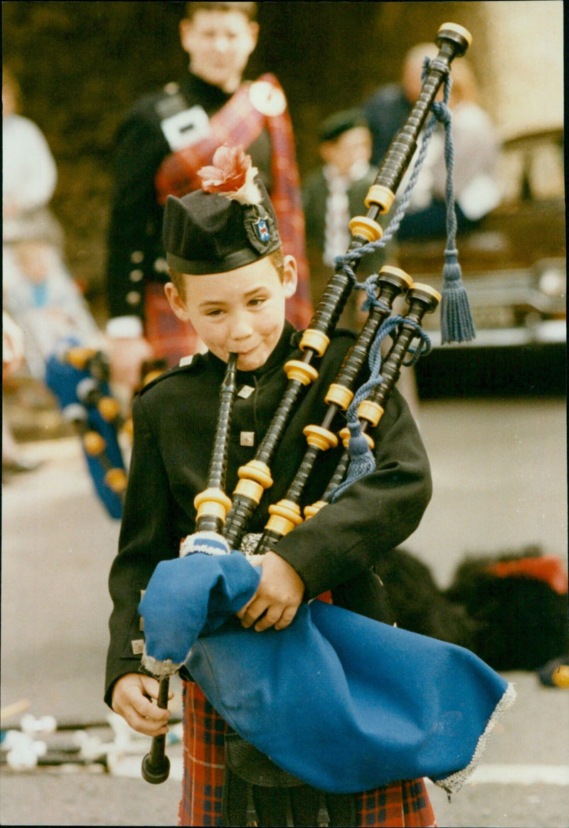 Robert Green, 8, plays the bagpipes with the Oxford Caledonian Band. - Vintage Photograph