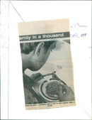 Students enjoying a meal of beans on toast in a student kitchen. - Vintage Photograph