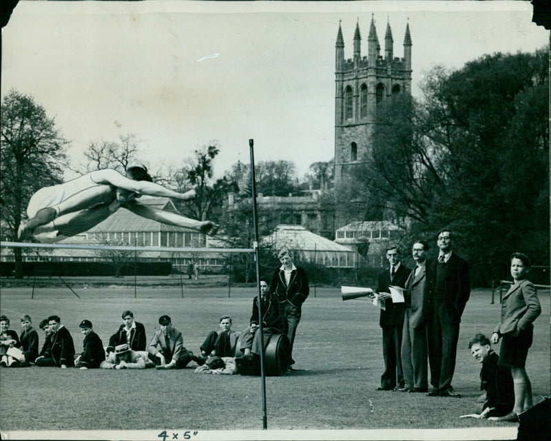 L.M. Simmons wins the intermediate high jump at 5ft. - Vintage Photograph