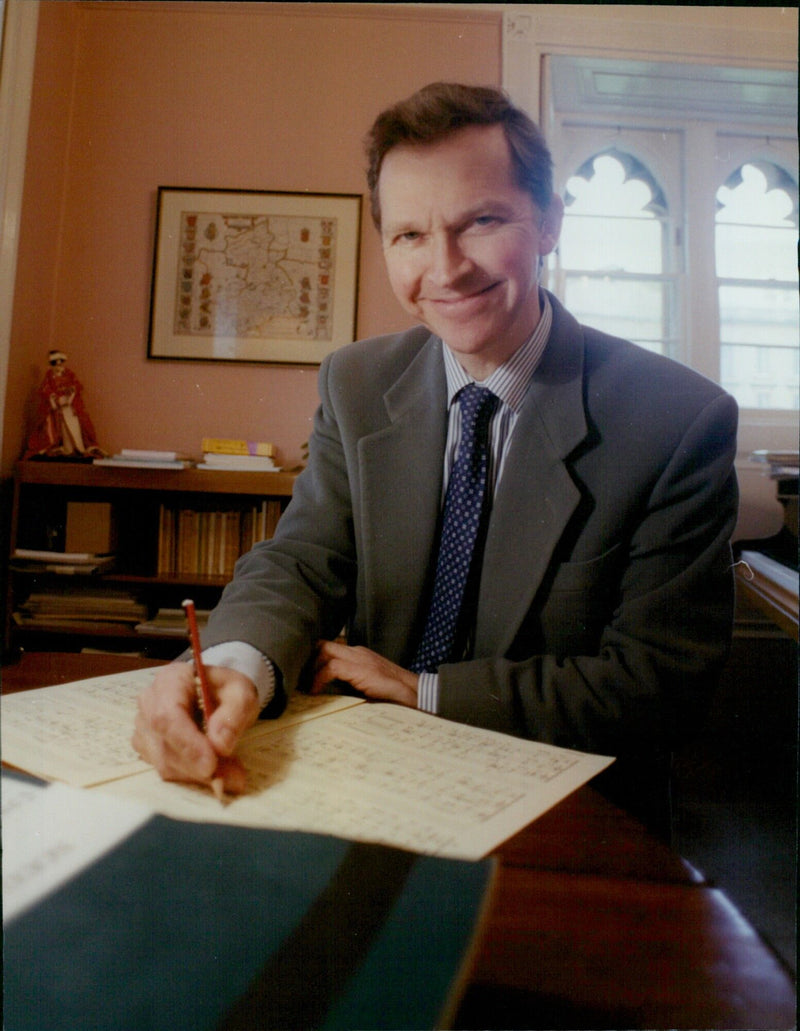 Choirmaster Bill Ives in his room and with the choir in the quad at Magdalen College, Oxford. - Vintage Photograph