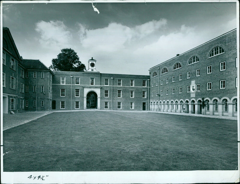 The Chancellor of the University, Mr. Harold Macmillan, opens the newly-completed quadrangle at Lady Margaret Hall, which was funded by a £100,000 grant from the Wolfson Foundation. - Vintage Photograph