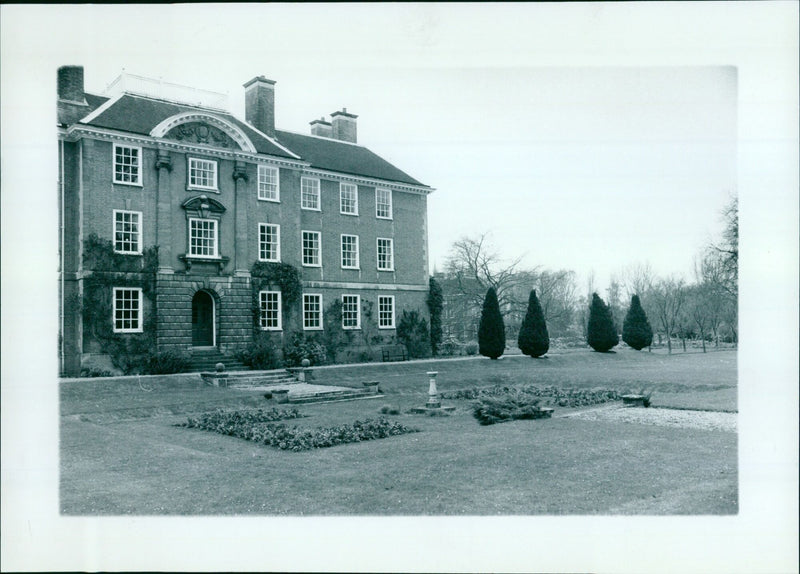 Lady Margaret Hall students are seen enjoying the Spring weather in the college's open garden. - Vintage Photograph