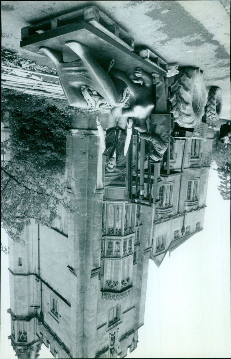 A group of students hold up signs during a protest in a city center. - Vintage Photograph