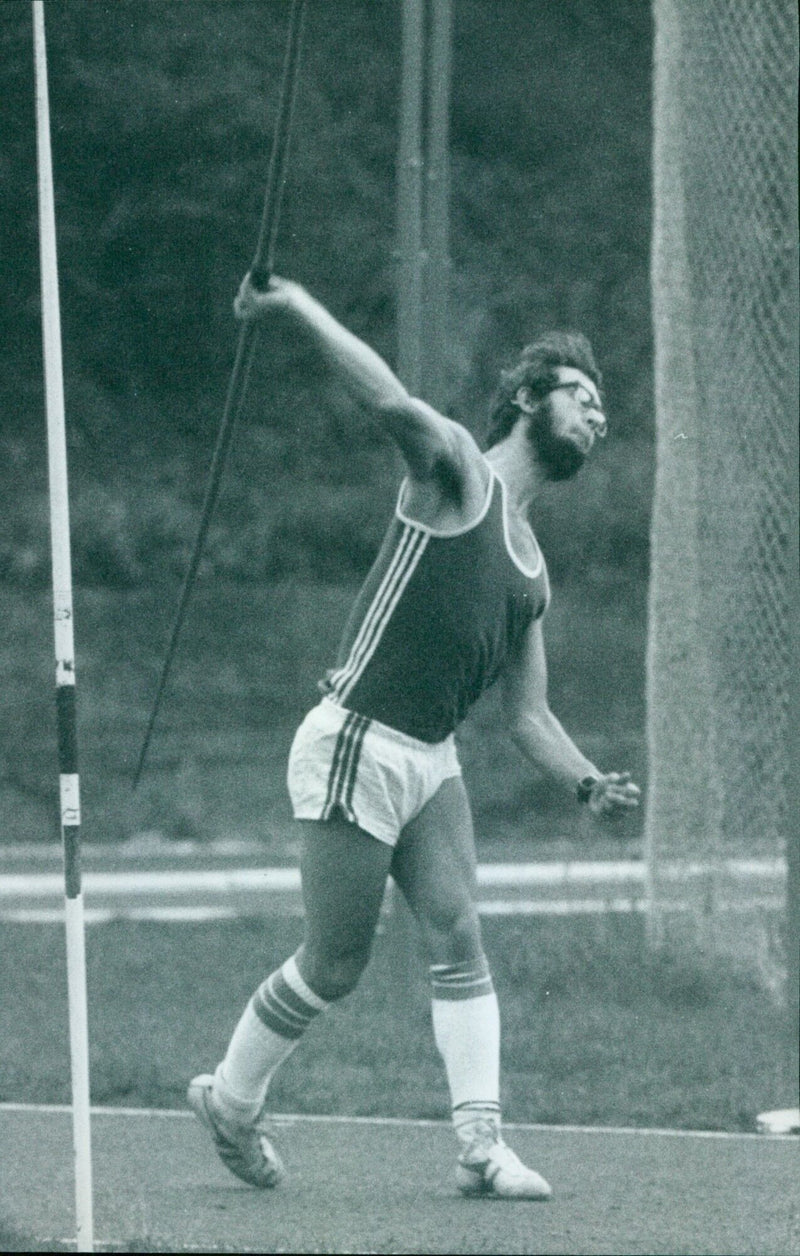 B. Herrod of New College, Oxford, competing at the Iffley Road Track. - Vintage Photograph