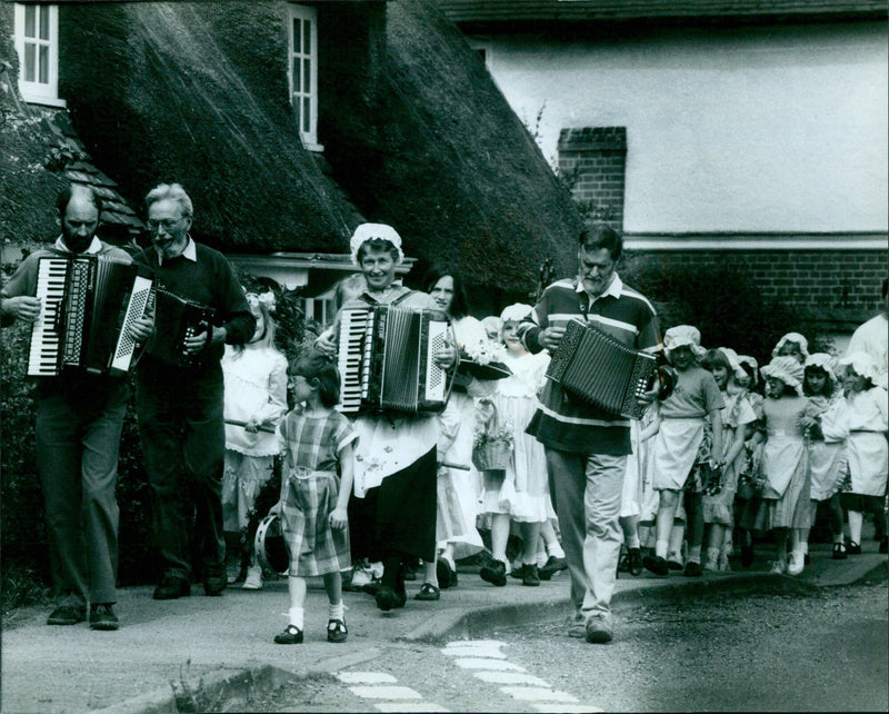 The May Queen procession makes its way to the Memorial Cross in Long Wittenham. - Vintage Photograph