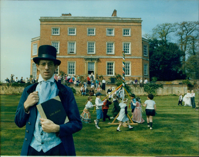 Head of Stadhampton Primary School, Toe Johnson, dancing with his pupils outside Le Chiske Haypton House. - Vintage Photograph