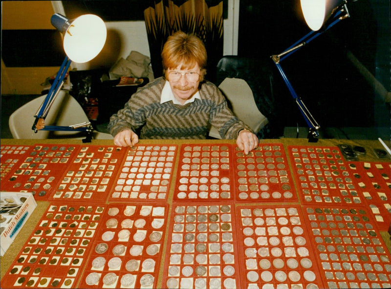 David Ruskin poses with his can collection. - Vintage Photograph