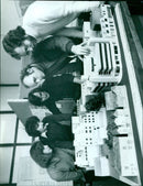 A soldier stands guard near the Berlin Wall in October 1977. - Vintage Photograph