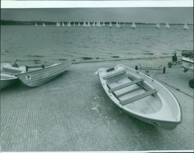 People enjoy a sunny day at Farmoor Reservoir in Oxford, England. - Vintage Photograph