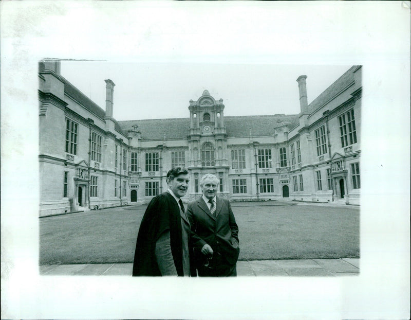 John Sanders and Ms. George Barnes share a kiss at the Schools goodingle ceremony. - Vintage Photograph