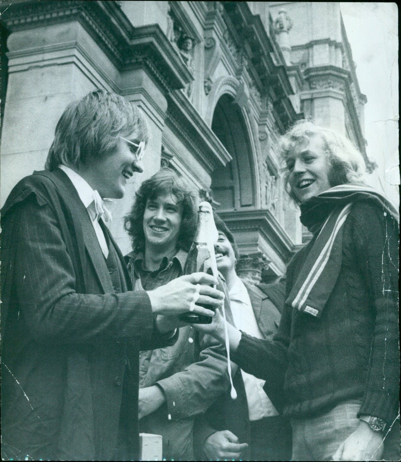 Students celebrate the completion of their Oxford Exams with champagne. - Vintage Photograph