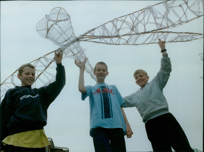 Three 12-year-old students from Abingdon Larkmead School build models for COMF 1 alongside two 11-year-olds. - Vintage Photograph