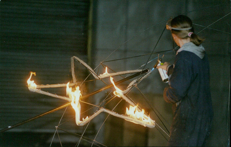 Neil Walker and Sarah Kenchington create fire sculptures for the Oxmillenium Fest. - Vintage Photograph