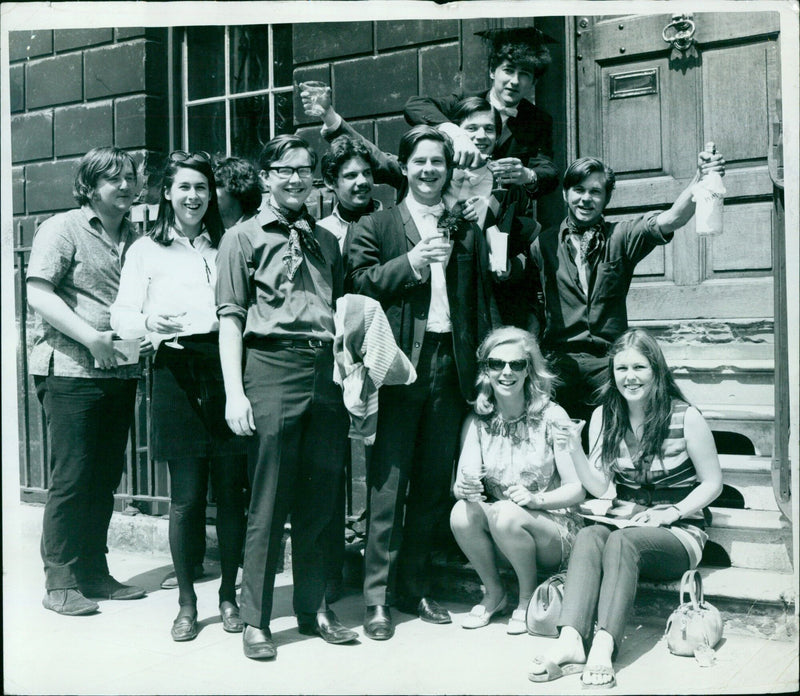 Graduates celebrate after leaving Examination Schools in Oxford. - Vintage Photograph