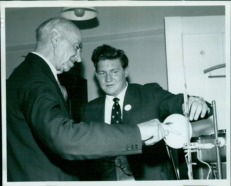 Professor J.E. Cooke and Sir Fredric Bartlett examine a temperature control simulator. - Vintage Photograph