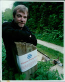 John Woodruffe and his dog Megan show their displeasure with a closure of a footpath due to a national outbreak of Mouth Disease. - Vintage Photograph