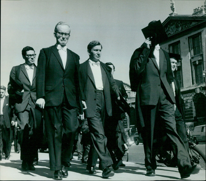 A group of people enjoying the sunshine in Oxford, England. - Vintage Photograph