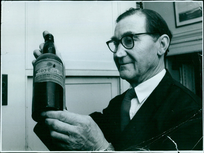 A bottle of spirits in an Oxford wine store. - Vintage Photograph